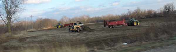 12-9-15 - Hudson Dairy dumping and spreading solids along US-127 just north of Hudson.
